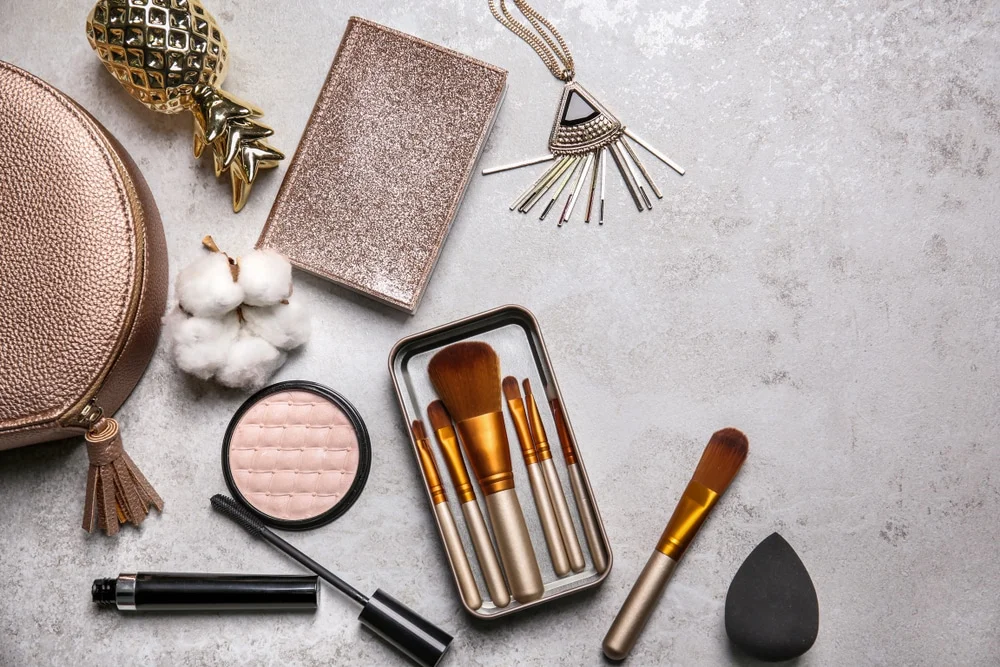 Flat,Lay,Composition,With,Professional,Makeup,Brushes,On,Light,Background